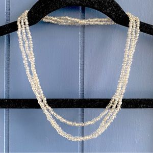 Long silvery beaded necklace, wear looped for different looks